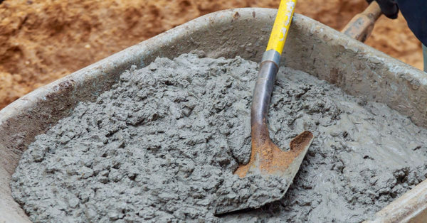 Wheelbarrow vs. Concrete Mixer: How to Mix in a Wheelbarrow (& When to Stop)